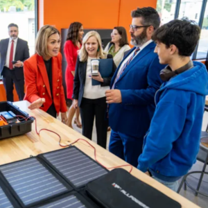 Kim Reynolds talks with younger people