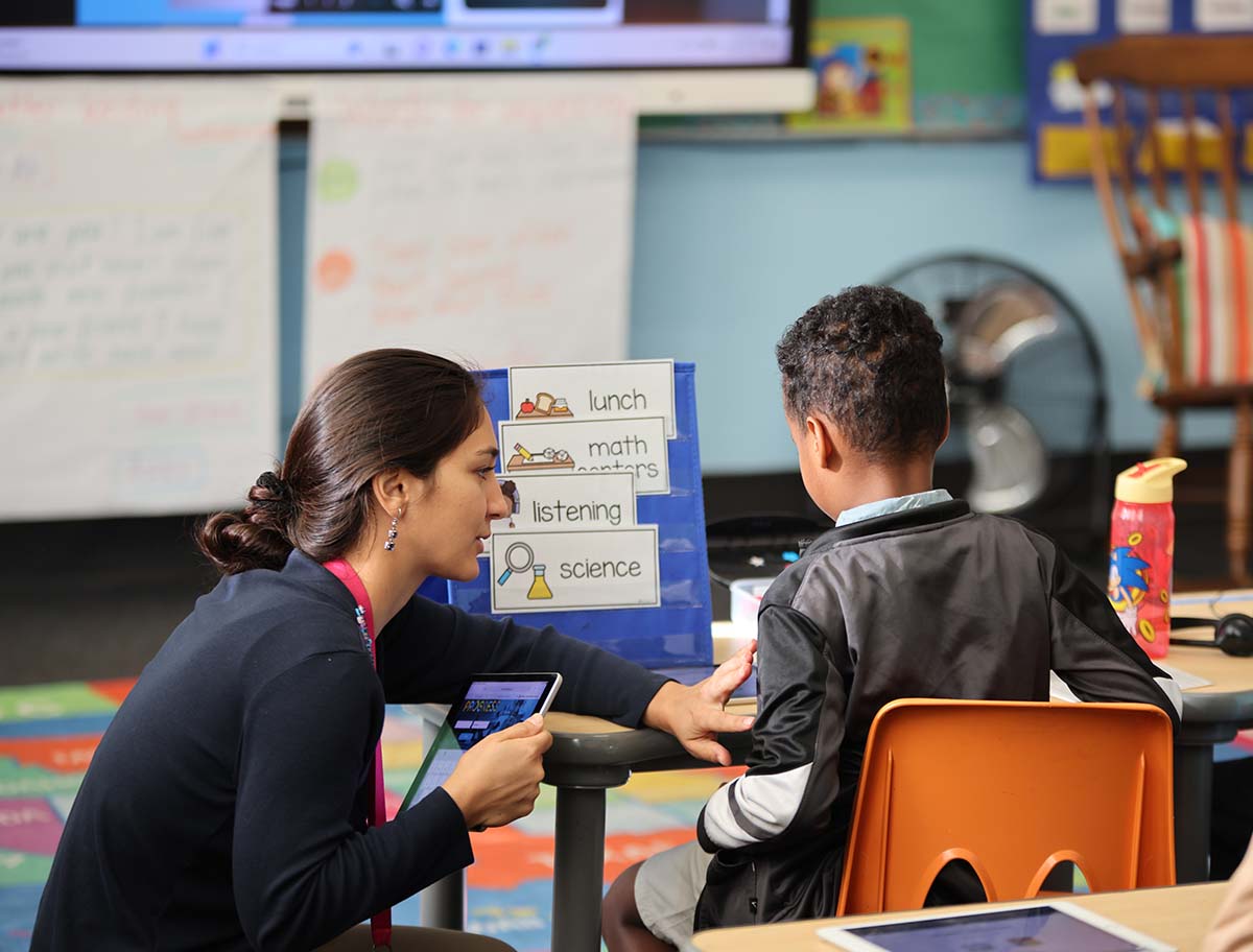 HSA Twin Cities Teacher working with a student.